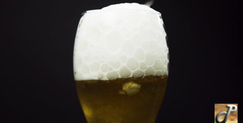 Refreshing Beer Being Poured Into Glass