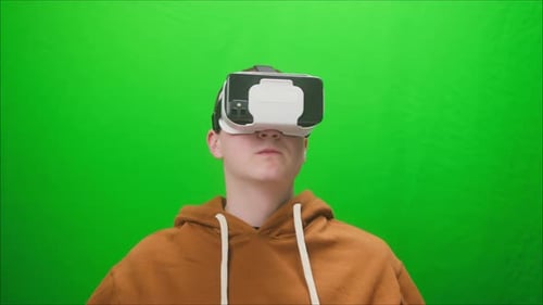 Closeup of Young Man Wearing Virtual Reality Glasses Playing Vr Video Games