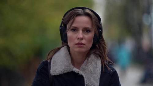 Autumn Spleen and Melancholy in City, Pretty Woman Is Strolling Alone and Listening To Music By