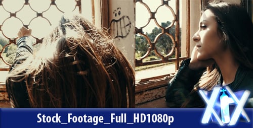 Young Woman by Grated Window in Abandoned Building