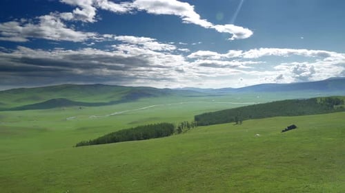 Expansive Green Hills and River Landscape