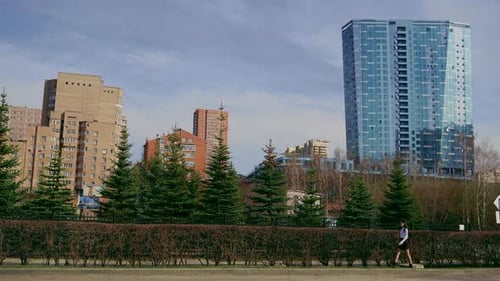Japanese Person Going Along the Street After School