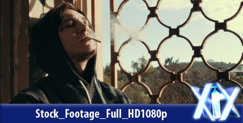 Homeless Young Man Smokes