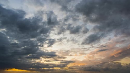 Dramatic Sunset Sky with Rolling Storm Clouds