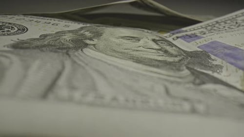 Close Up of Stacked Hundred Dollar Bills