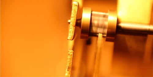 Metallic Cog Rotating in Extreme Close Up