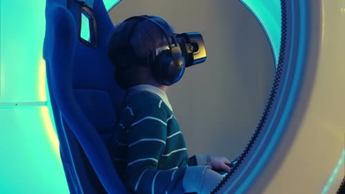 Little Boy Experiencing Virtual Reality Attraction