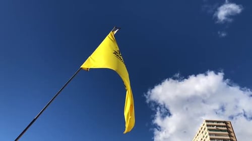 Flag of Benidorm Waving in the Wind