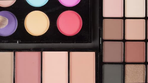 Cosmetics Palette with Various Colors and Brush
