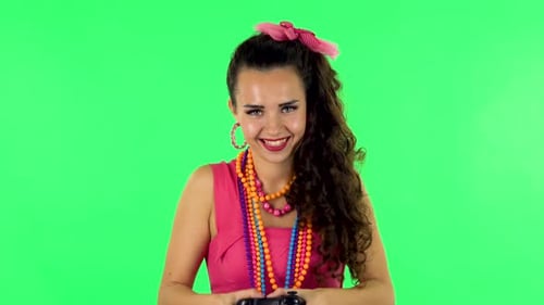 Excited Woman Playing Video Game on Green Screen
