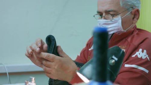 The Man Who is Disabled Makes Shoes