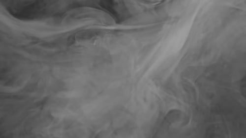 Abstract Swirling Smoke Against Black Background