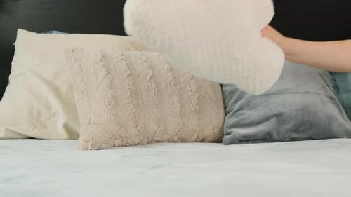 Cloud Pillow Placed on Comfortable Bed with Pillows
