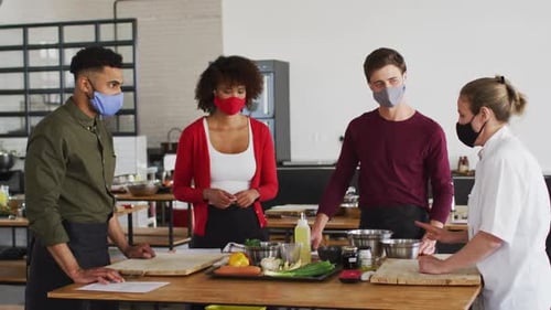 Cooking Lesson with Chef and Diverse Adult Students