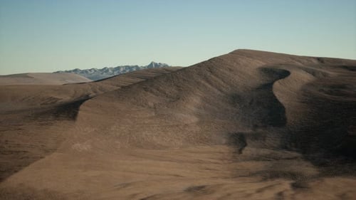 Aerial View on Big Sand Dunes in Sahara Desert at Sunrise