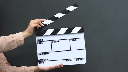 Female Hands With Clapper on Blackboard Background, Successful Career, Startup