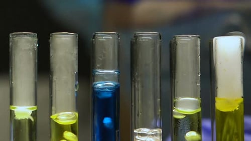 Colorful Liquid Experiments in Test Tubes Close Up