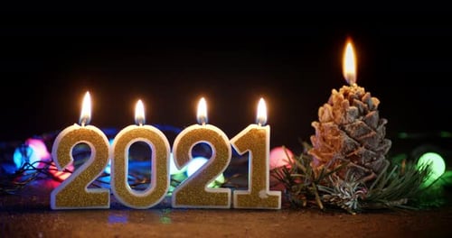 New Year's Figures 2021 with a Candle.
