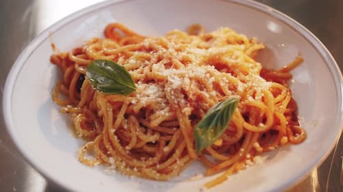 Delicious Spaghetti with Tomato Sauce, Cheese and Basil
