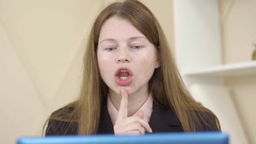 Close-up Face of Language Teacher Teaching Online