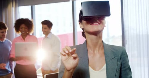 Woman Using VR Headset in Modern Office