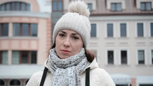 Woman in Winter Hat Posing Outdoors