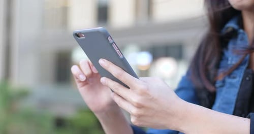 Woman use of mobile phone