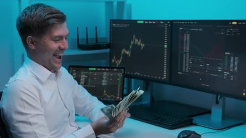Businessman analyzing a graphic of a stock exchange chart. young male businessman accounts