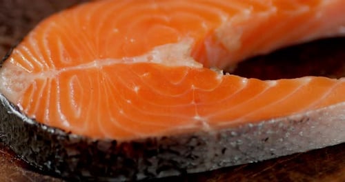 Raw Salmon Steak on the Table.