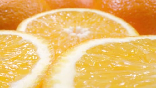Macro Dolly Shot von frischen saftigen Orangenfrüchten