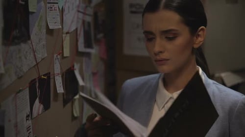 Federal Bureau Investigator Woman Looking Through the Files, Complicated Case