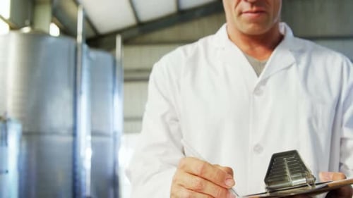 Technician preparing a report