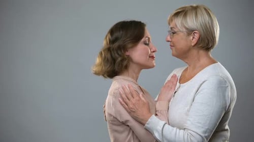 Loving Embrace Between Mother and Daughter