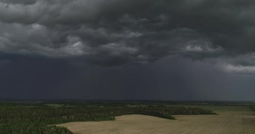 Aerial Dark Ominous Grey Storm Clouds. Dramatic Sky. Lighting In Dark Stormy Clouds