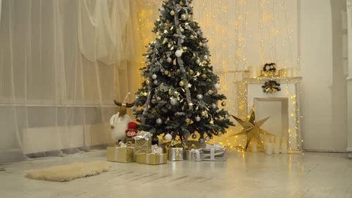 Decorated Christmas Tree with Presents and Fireplace