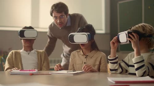 Children Using VR Headsets in Classroom with Teacher
