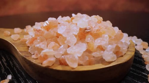 Himalayan Pink Salt in Wooden Spoon Close-up