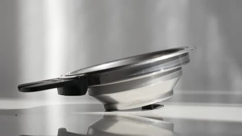 Ground Coffee Being Added to Filter for Brewing