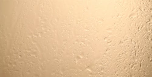 Water Droplets Running Down Opaque, Textured Surface