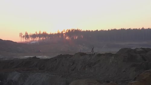 Golden Sunrise Over Outdoor Mining Operation