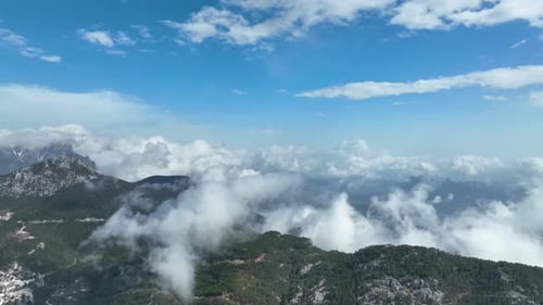 Cloudy landscape high in the mountains aerial view 4 K