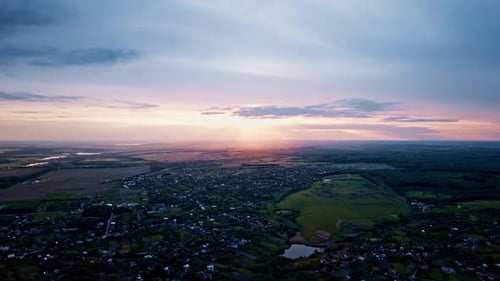 Aerial View of Beautiful Village in at Sunset in Summer