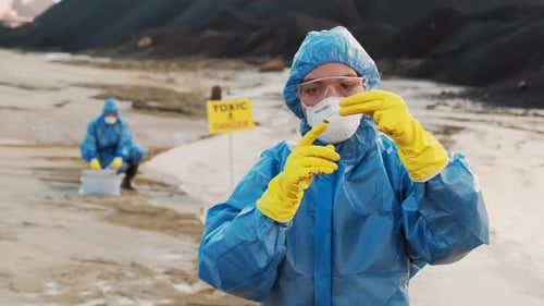 Portrait Of Environmentalist In Protective Suit