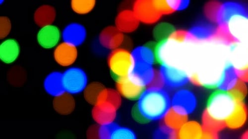 Vibrant Bokeh Lights Shimmering on Black Background