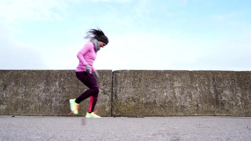 Girl Jogger Tying Running Shoes Outdoor.