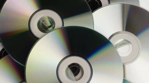 Prise de vue rotative de disques compacts