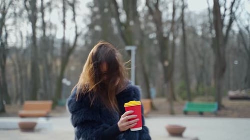 Woman posing in the park. Pretty young woman posing outdoors in nature