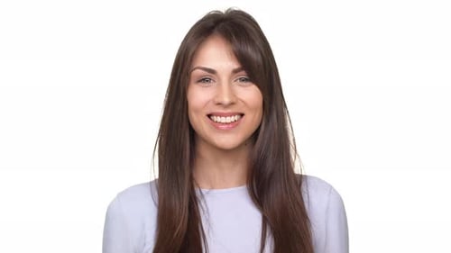 Attractive Woman with Brown Hair Smiles