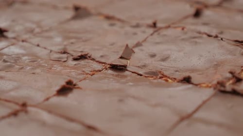 Glazed and cracked chocolate cake surface close-up 4K 2160p 30fps UltraHD footage - Tasty looking
