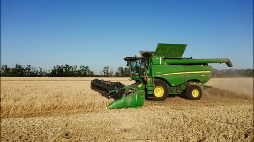 Combine Harvesting Wheat Top View of a Wheatfield